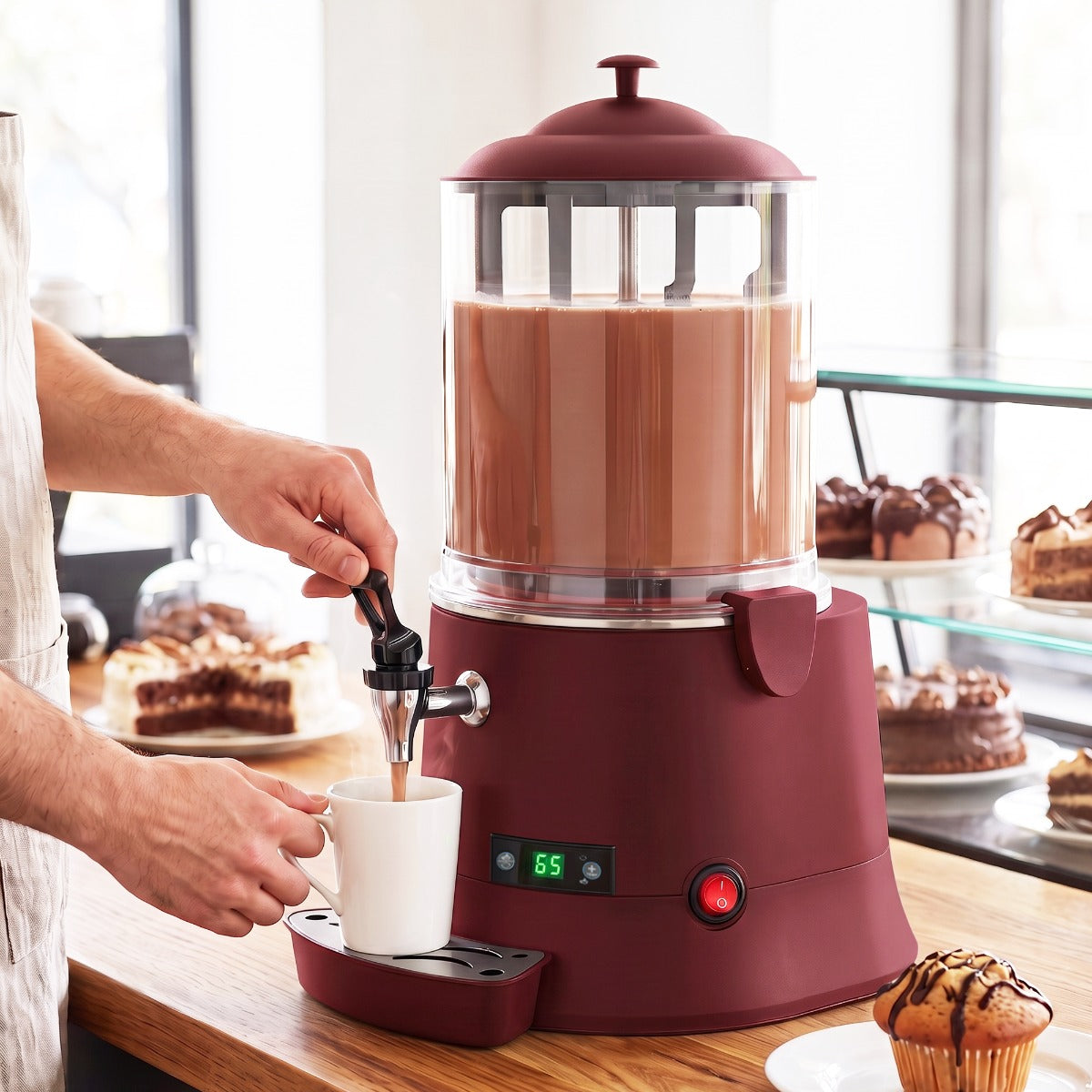 Coldline CHOCO10R hot chocolate dispenser, serving hot chocolate in a cafe