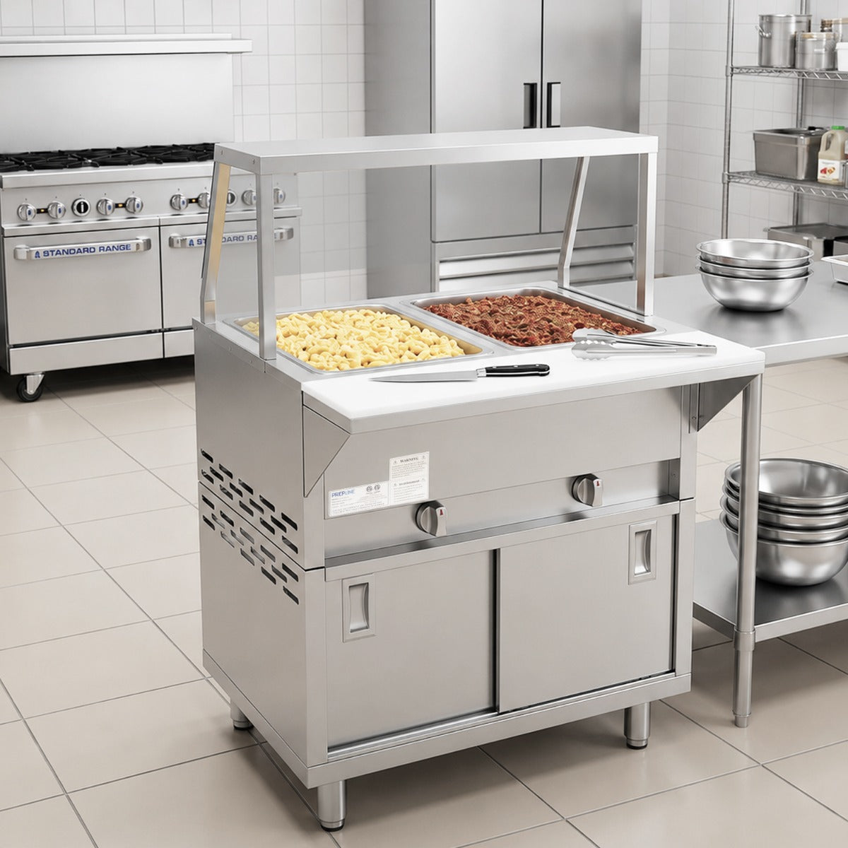 Prepline GSTC30-2S-SG gas steam table with sneeze guard, holding food pans in a kitchen