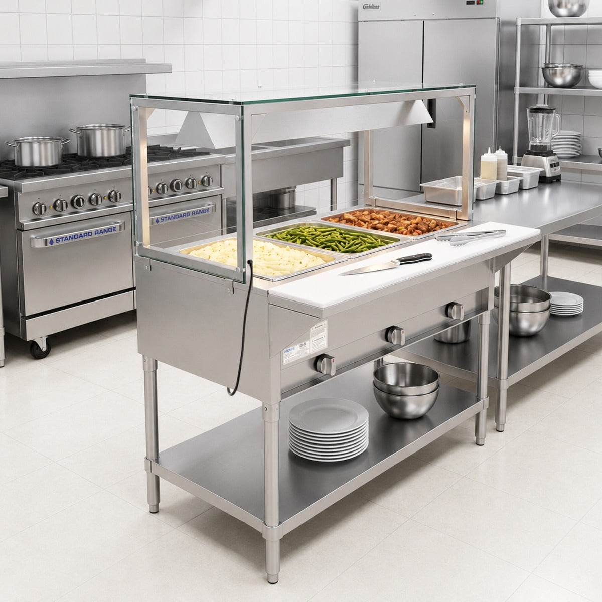 Prepline GST48-3O-LT gas steam table with lighted sneeze guard, holding food in a commercial kitchen