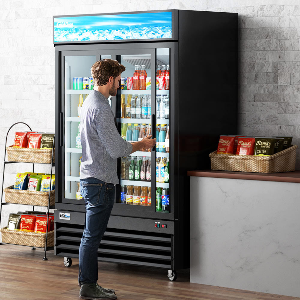 Coldline G53S-B black glass door merchandiser refrigerator, in use in a store (representative image)