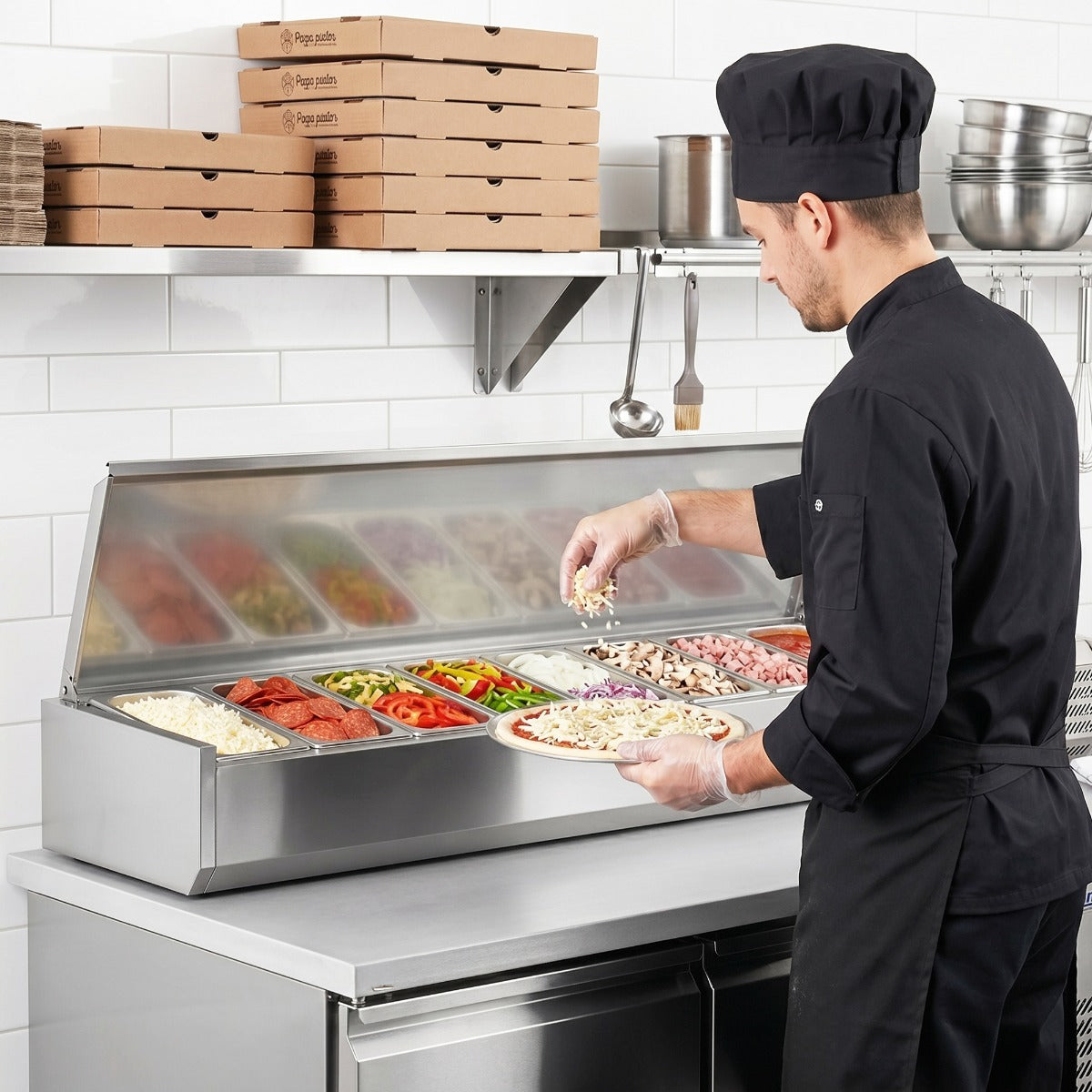 Coldline CTP70SS refrigerated countertop salad bar, in use at a pizza prep counter (representative image)