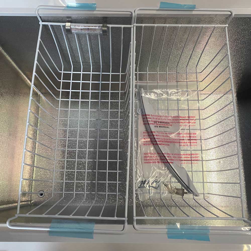Coldline CF60 commercial chest freezer, wire baskets inside the cabinet