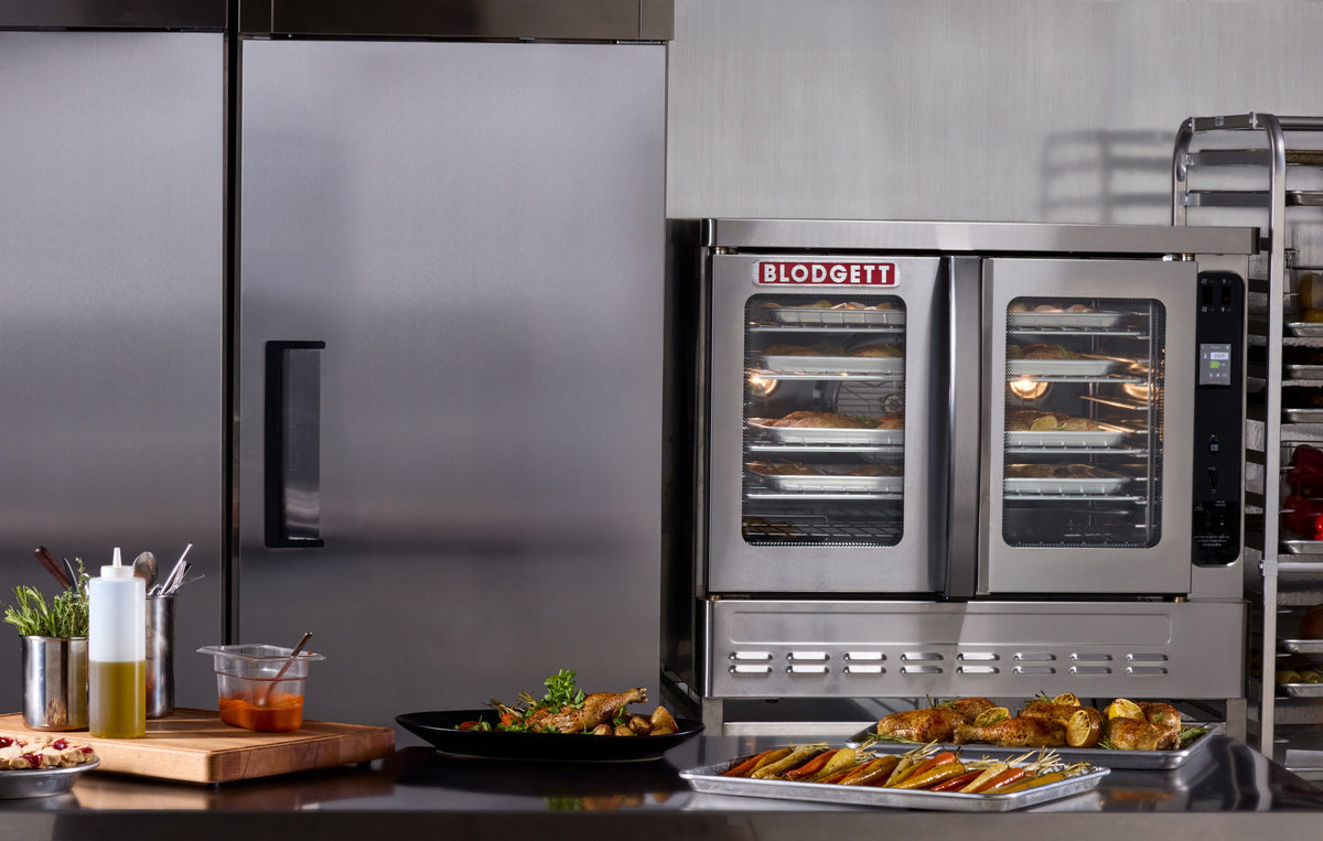 Blodgett convection oven with roasted food in a commercial kitchen
