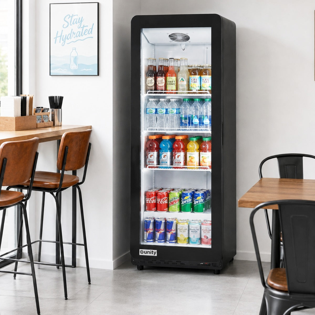 Unity BLU-22SB glass door merchandiser refrigerator, stocked with drinks in a cafe