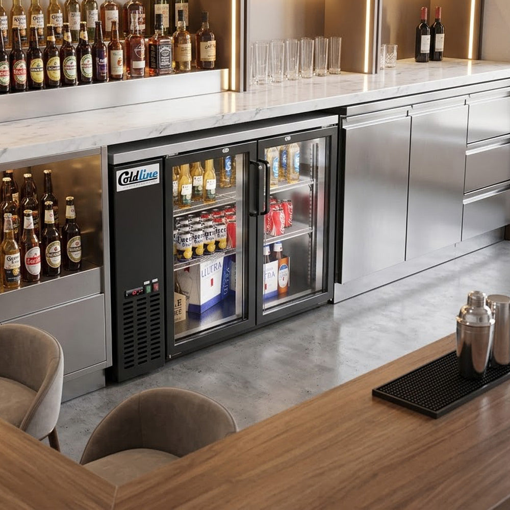 Coldline CBB-48G black swing glass door back bar cooler, behind a bar (representative image)