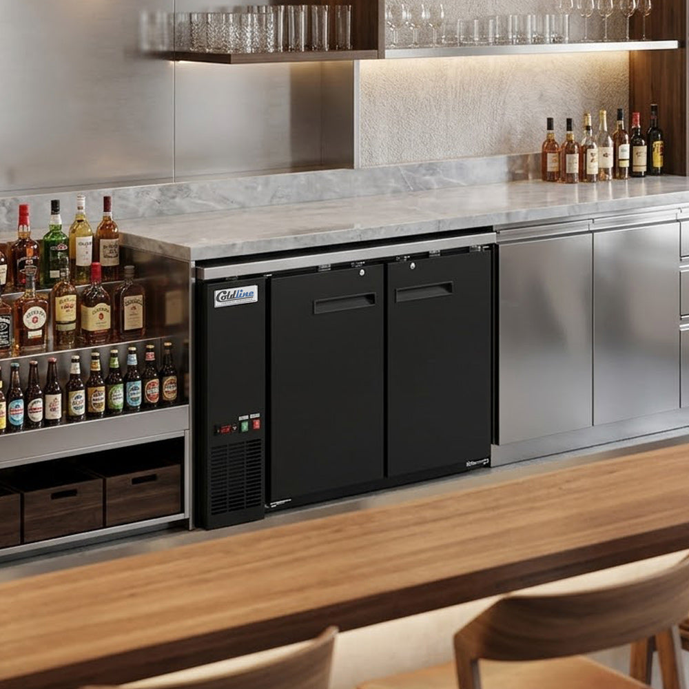 Coldline CBB-48 black 2-door back bar cooler, installed under a bar counter (representative image)
