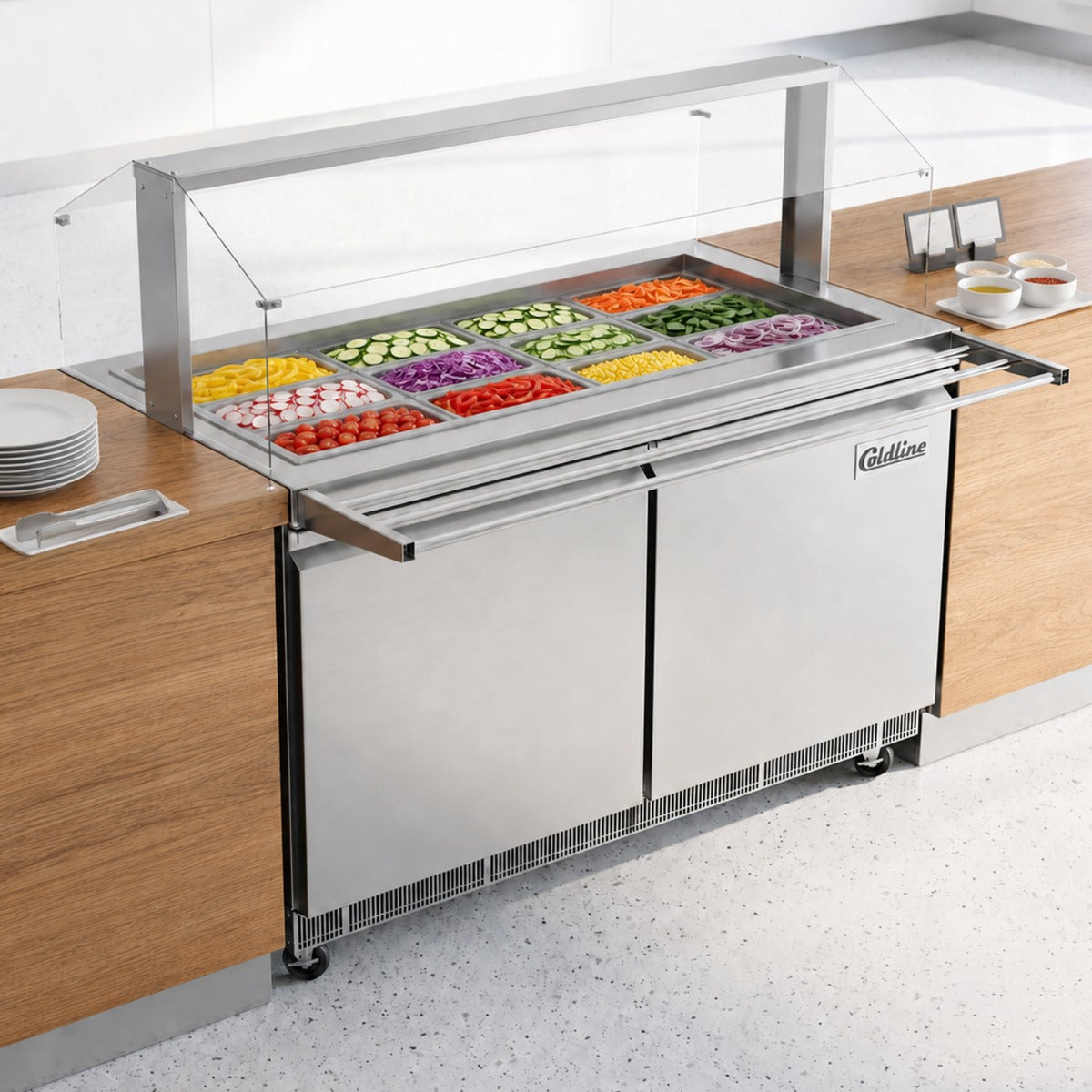 Coldline CBT-60-CSG refrigerated salad bar buffet table, in use with food pans (representative image)