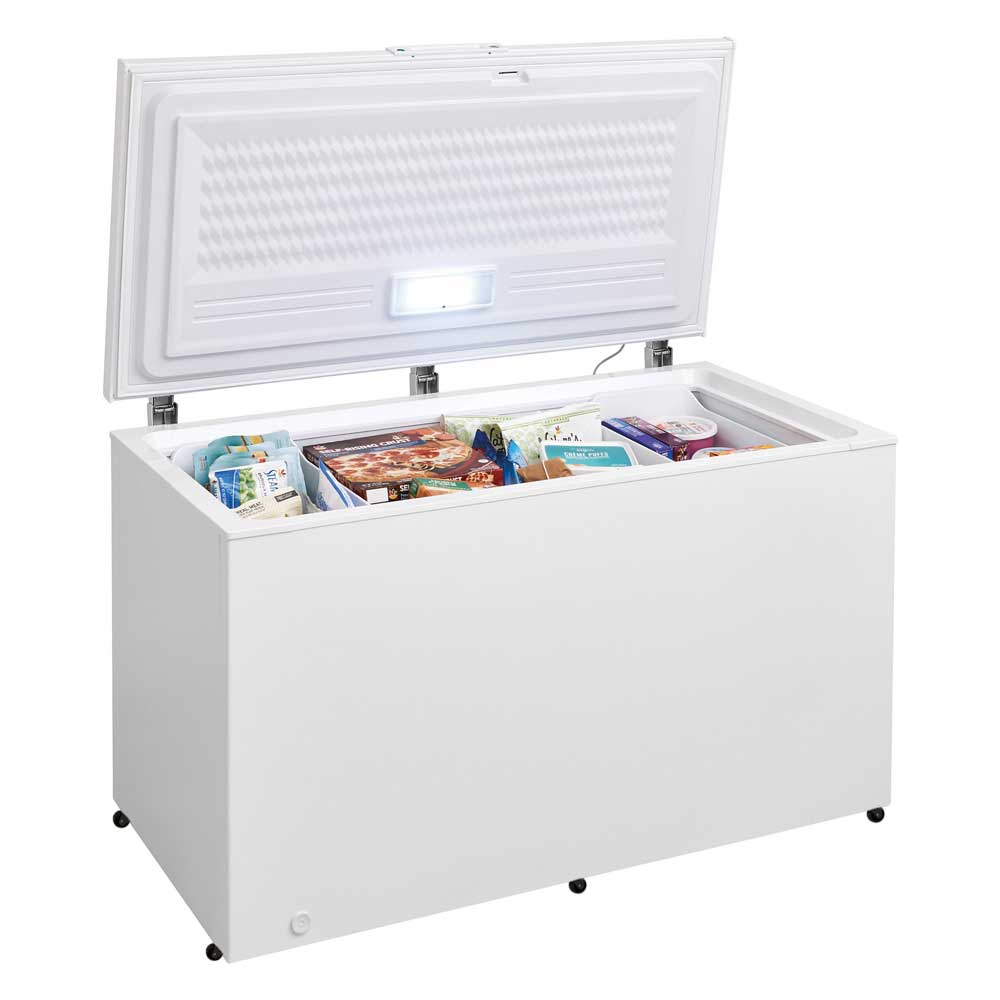 Coldline CF60 commercial chest freezer, lid open with frozen food inside