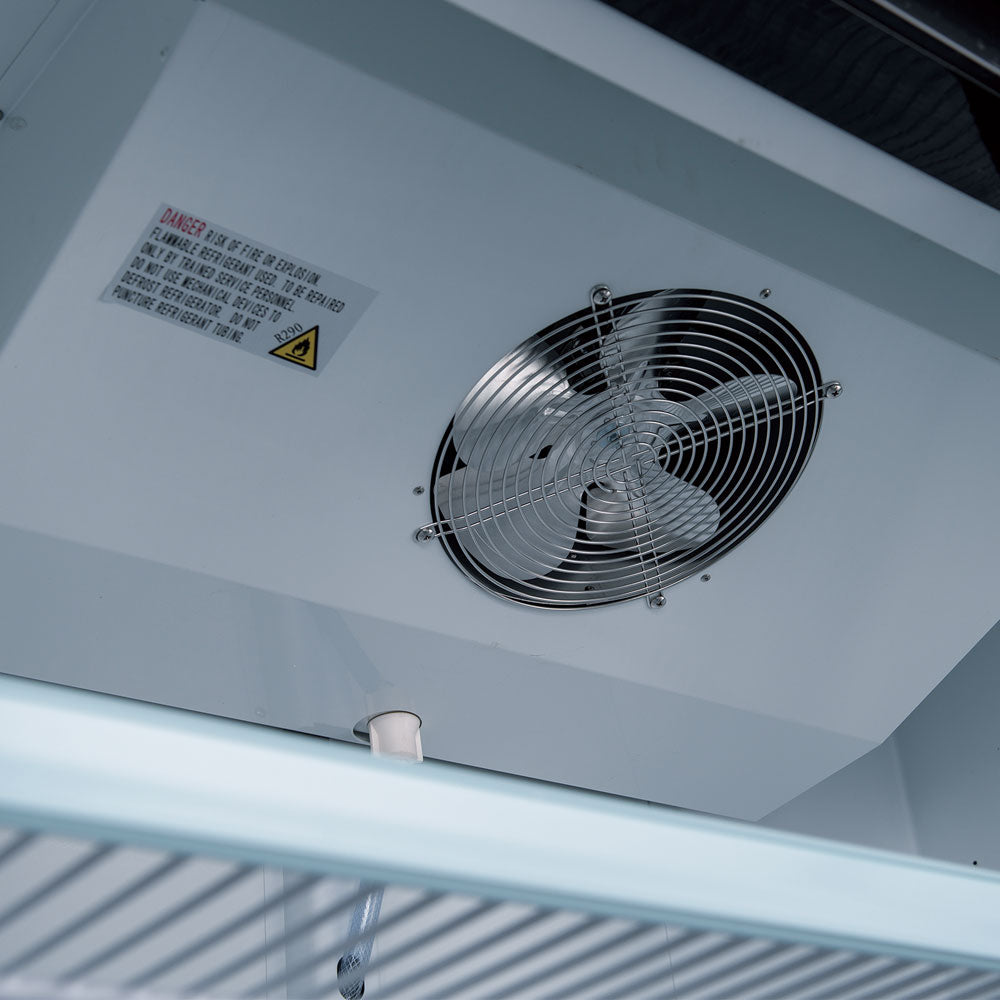 Coldline D80-B black glass door merchandiser freezer, close-up of the evaporator fan