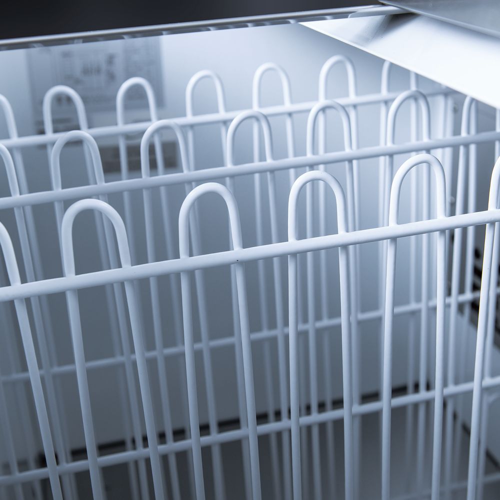 Coldline BBC-80 black horizontal bottle cooler, coated wire dividers inside, close-up