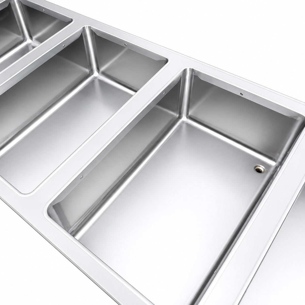 Prepline ESTC60-4S-110 4-well electric steam table, sealed well with drain opening, close-up (representative image)