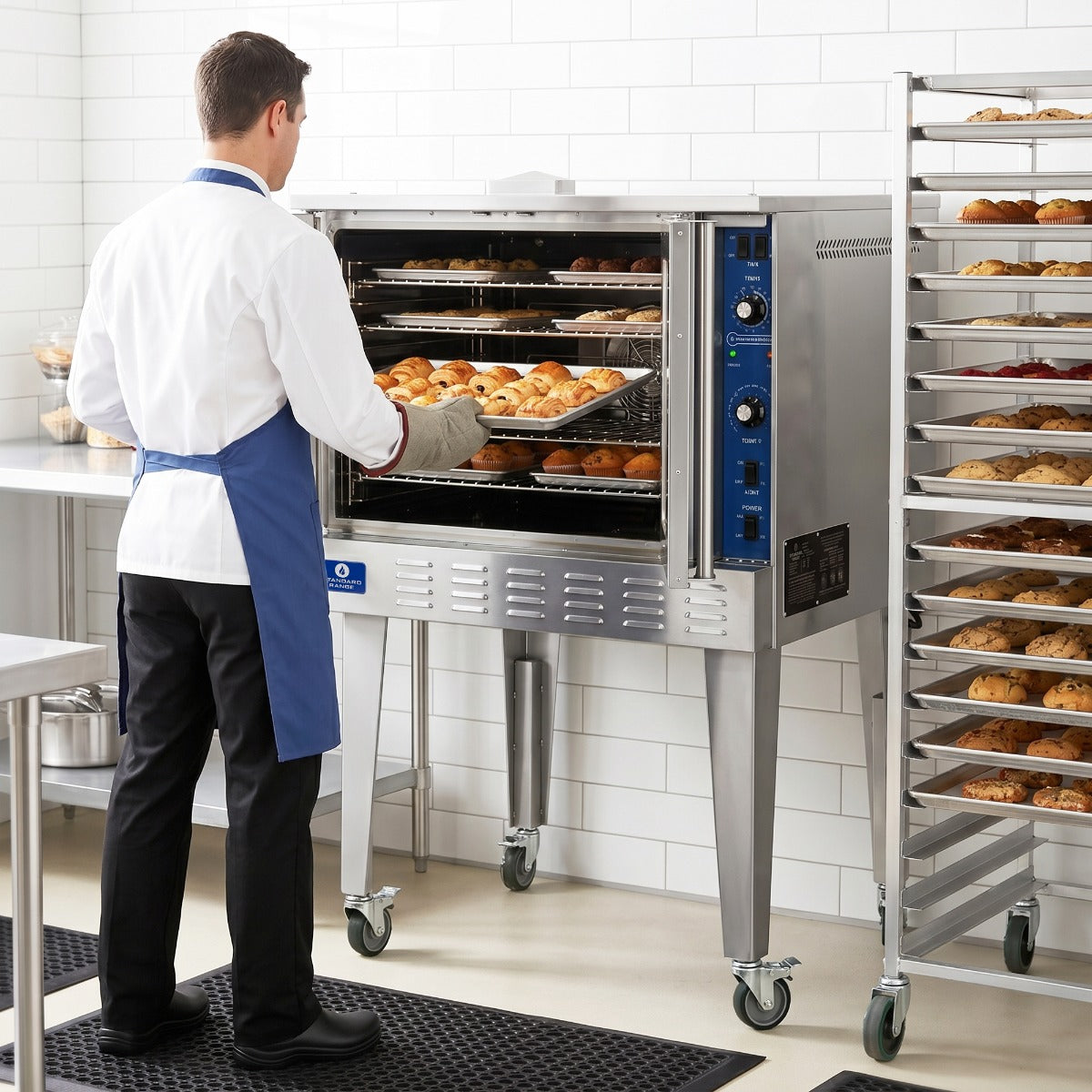 Standard Range SR-COG-SGL single deck gas convection oven, in a commercial kitchen with a sheet pan rack