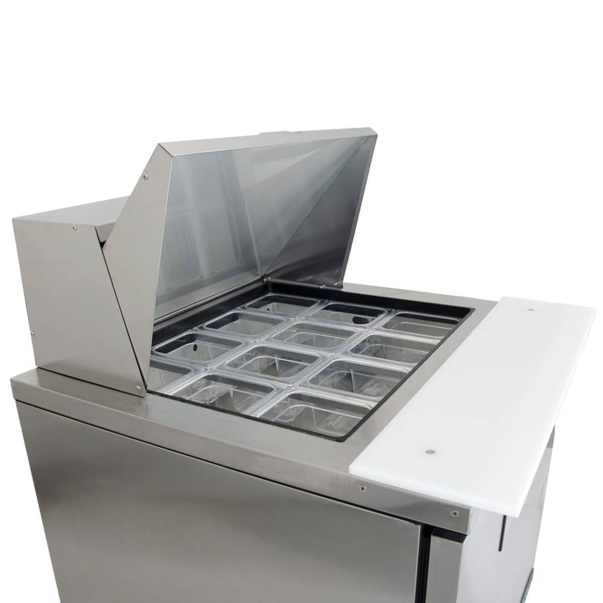 True TFP-32-12M-HC food prep table, top angle view of the pans and cutting board