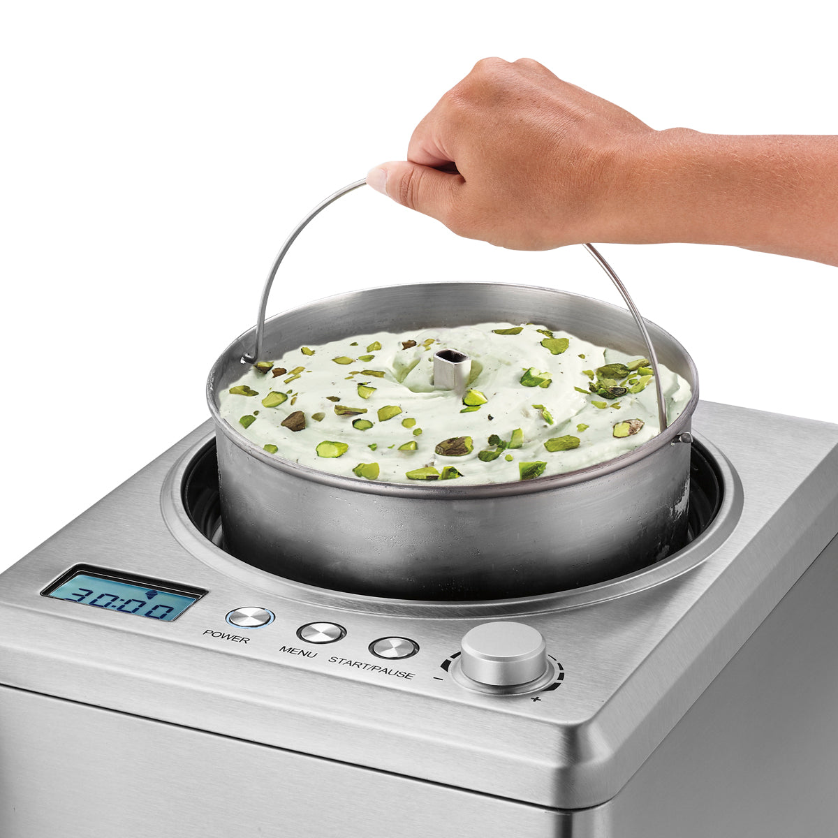 Waring WCIC25 2.5 qt. compressor ice cream maker, lifting out the batch bowl with finished ice cream
