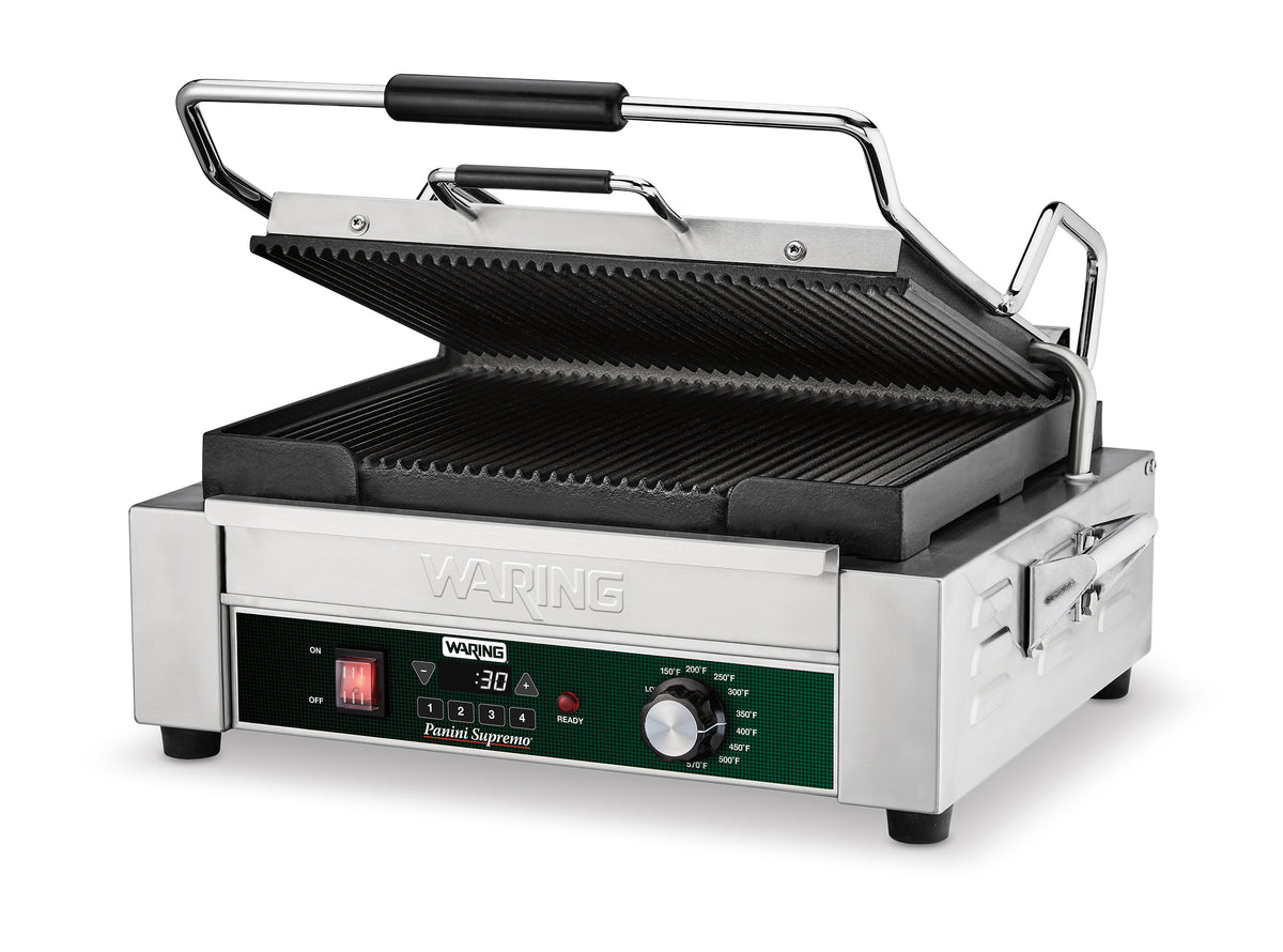 Waring WPG250TX panini grill, front angle view, lid open showing ribbed plates and digital timer panel