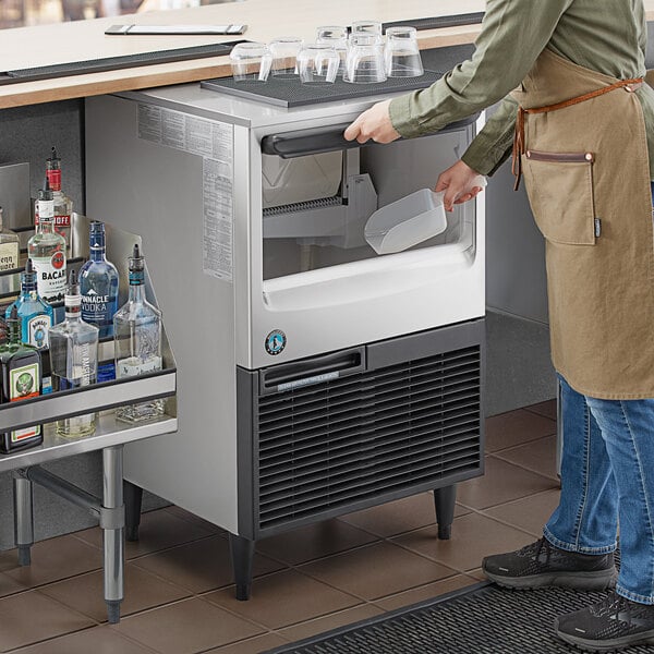 Hoshizaki KM-161BAK 23 3/4" ADA-Compliant Air-Cooled Undercounter Crescent Cube Ice Machine with 78 lb. Storage - 156 lb., 115V