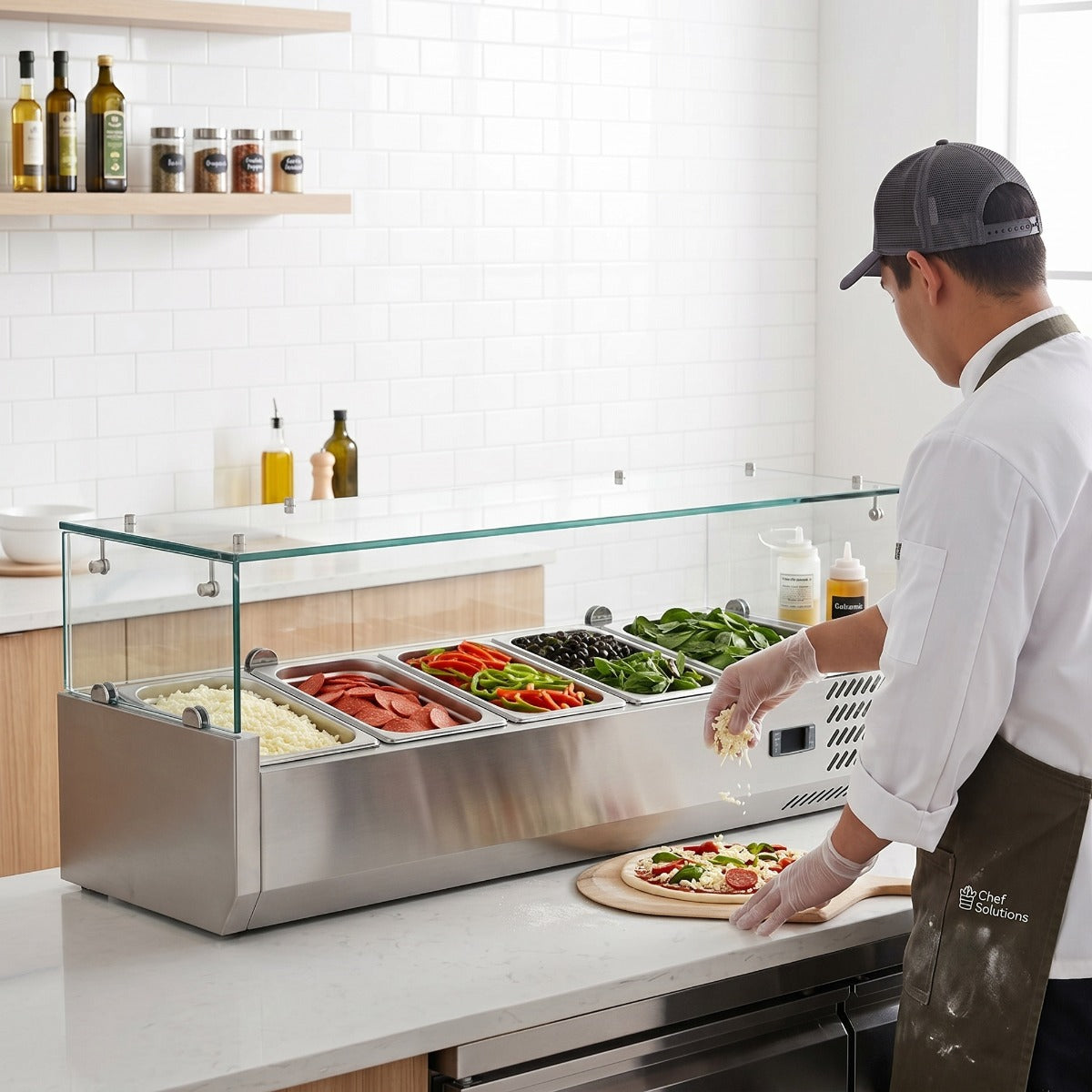 Coldline CTP48SG refrigerated countertop salad bar, in use at a pizza prep counter (representative image)