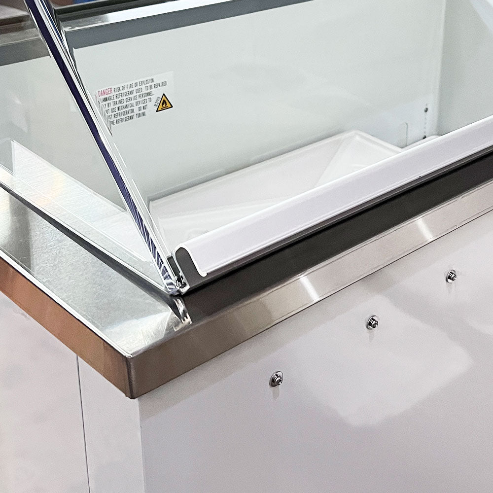Coldline DIP-88 ice cream dipping cabinet, canopy glass and stainless steel top edge, close-up