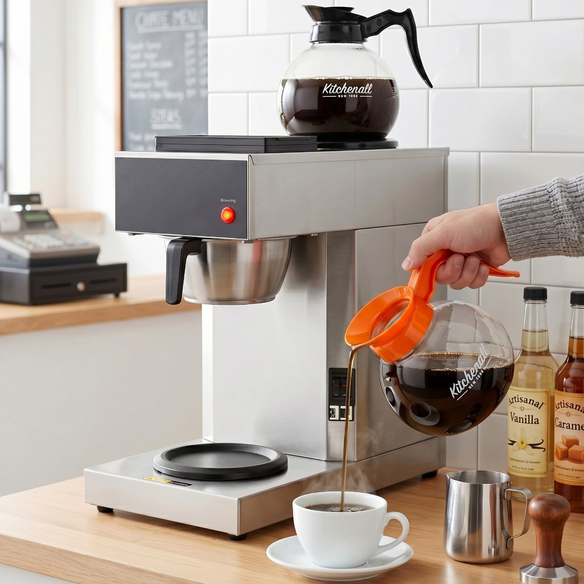 Prepline CAFE-2P-1 coffee maker, brewing into a decanter, lifestyle