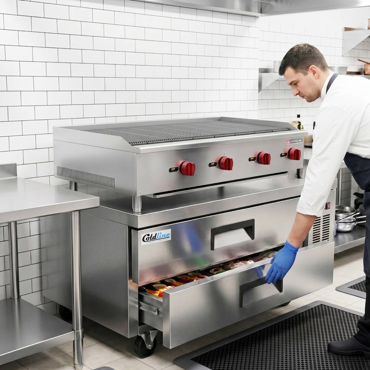 Coldline CB48 2-drawer refrigerated chef base, in use under a countertop griddle, lower drawer open (representative image)