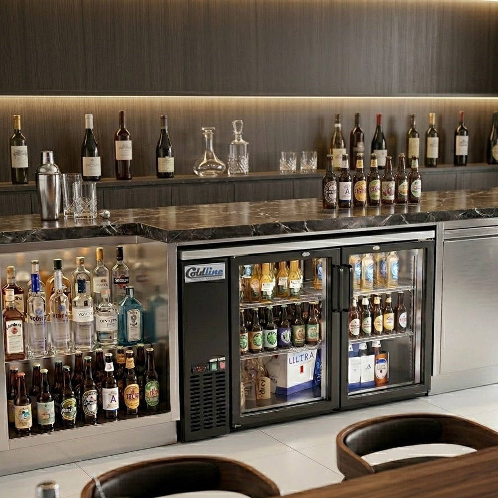 Coldline CBB-60G black swing glass door back bar cooler, behind a bar (representative image)