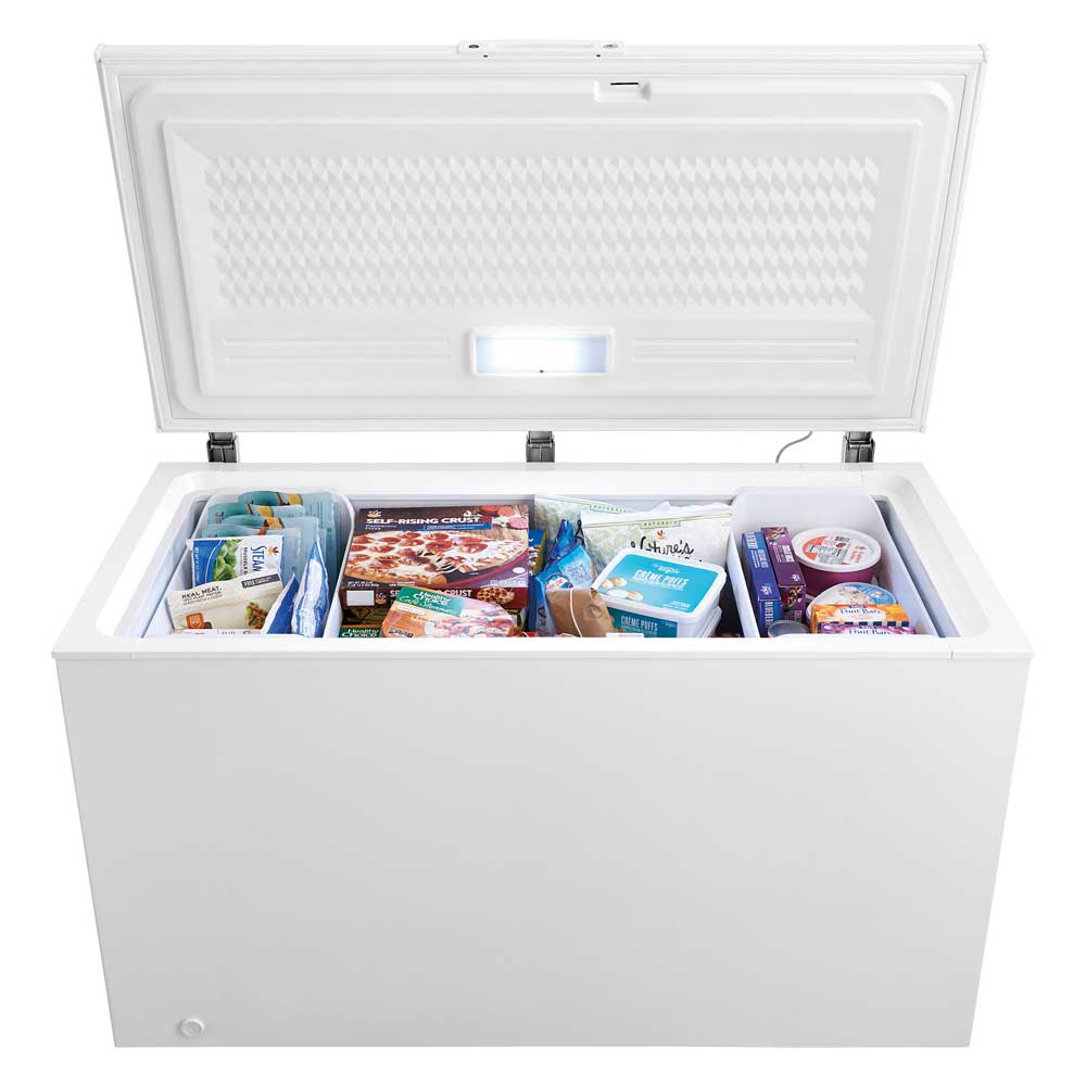 Coldline CF60 commercial chest freezer, lid open with frozen food inside
