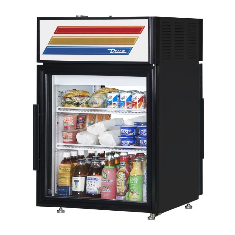True GDM-05PT-HC~TSL01 countertop glass door merchandiser, black exterior, front angle view, stocked with product