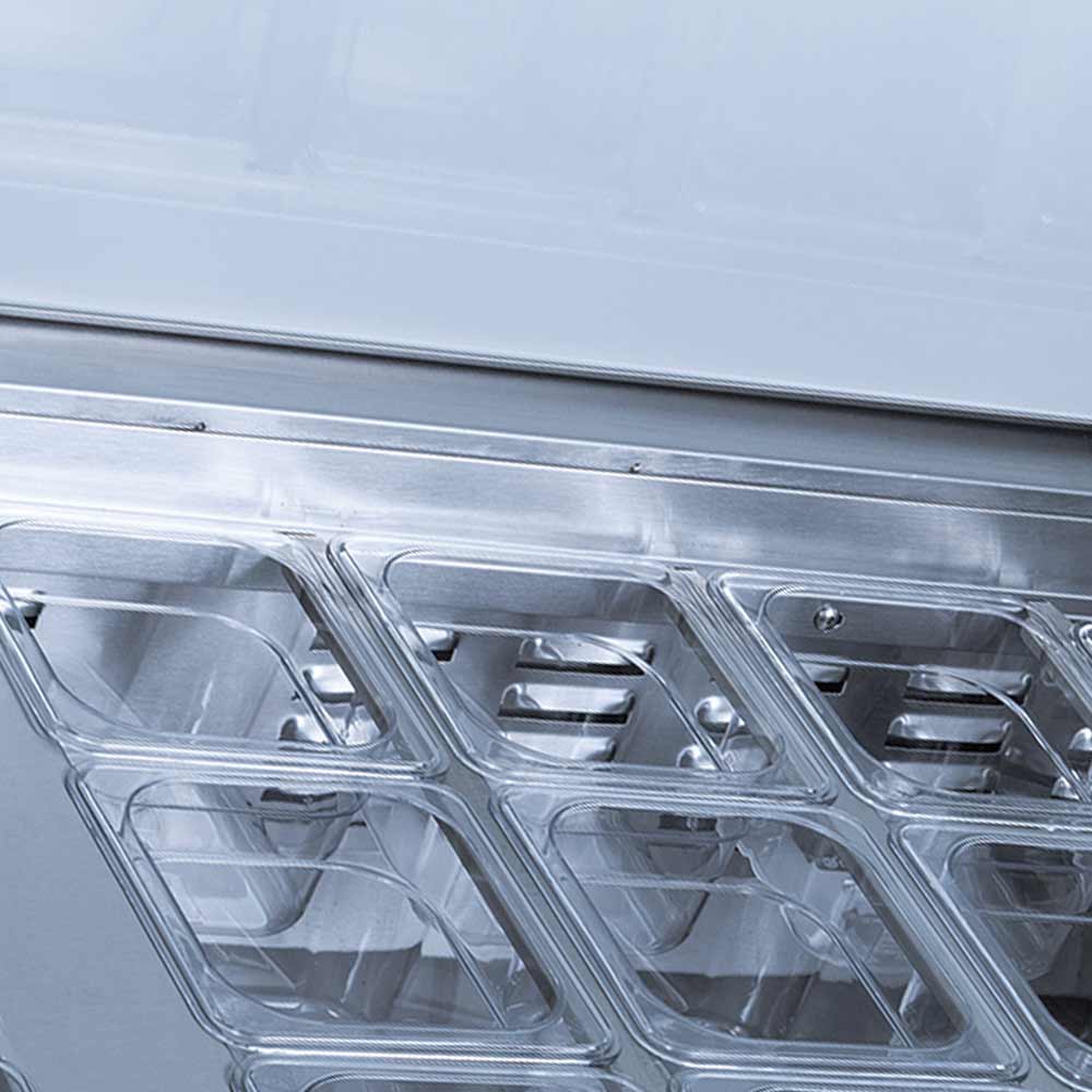Coldline SP48 sandwich prep table, clear pans in the rail, close-up