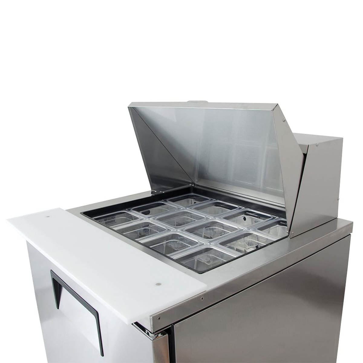 True TFP-32-12M-HC food prep table, close-up of the food pans and cutting board
