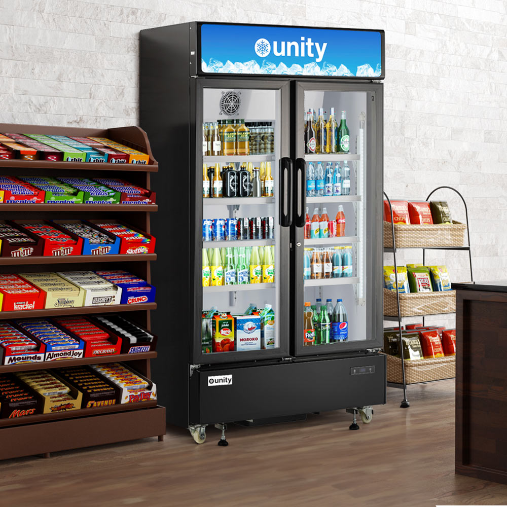Unity U-48M two glass door merchandiser refrigerator, stocked with drinks in a store